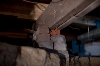 Your home's crawl space should not be teetering atop unsecured support systems.